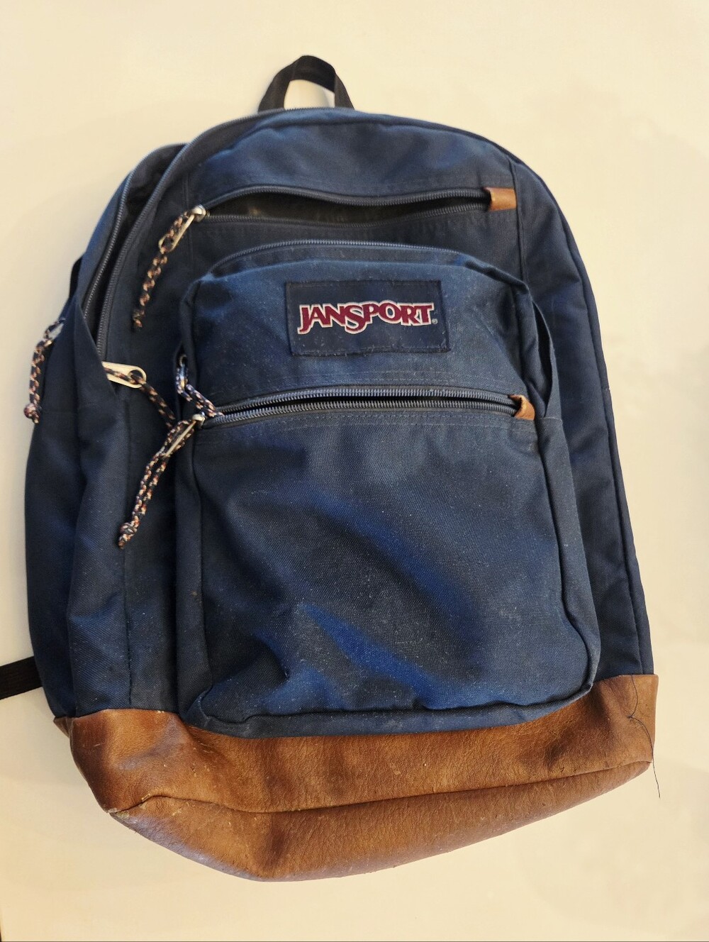 Jansport Navy Backpack with Brown Leather Base